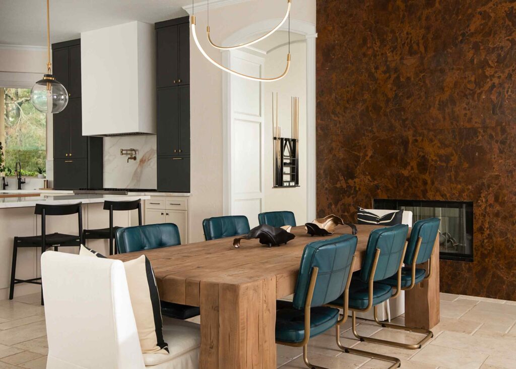  Open-plan luxury entertaining space designed by CW Interiors in The Woodlands Texas with seamless flow between living and dining.